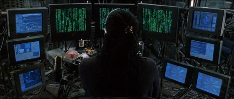 The operator scene from The Matrix, screens full of scrolling green code